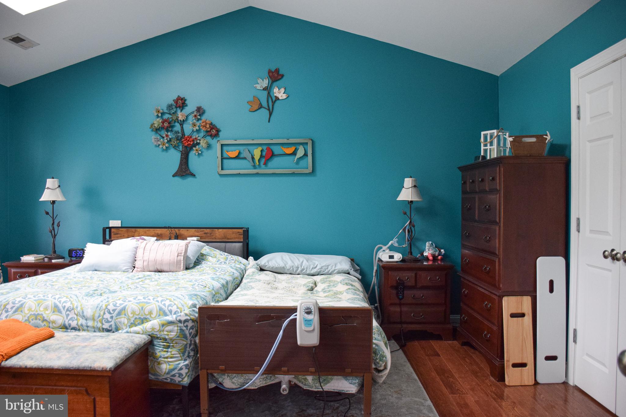 765 Gun Club Road Stephenson, VA 22656 - Photo 36 of 113 a bedroom with a bed and dresser