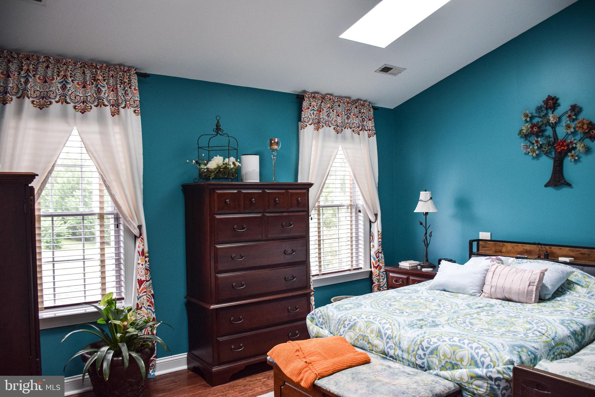 765 Gun Club Road Stephenson, VA 22656 - Photo 37 of 113 a bedroom with a bed and a window