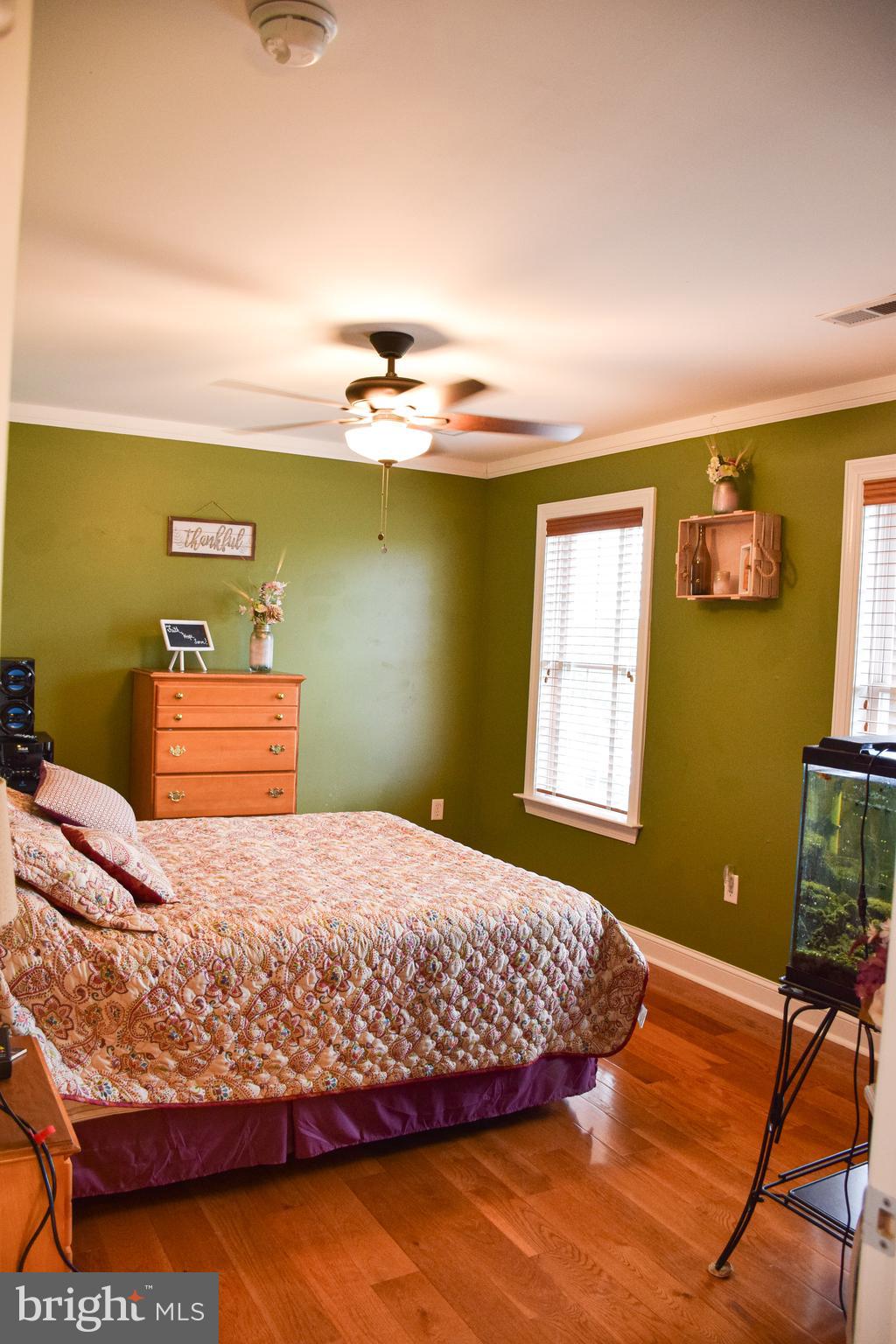 765 Gun Club Road Stephenson, VA 22656 - Photo 42 of 113 a bedroom with a bed and a window