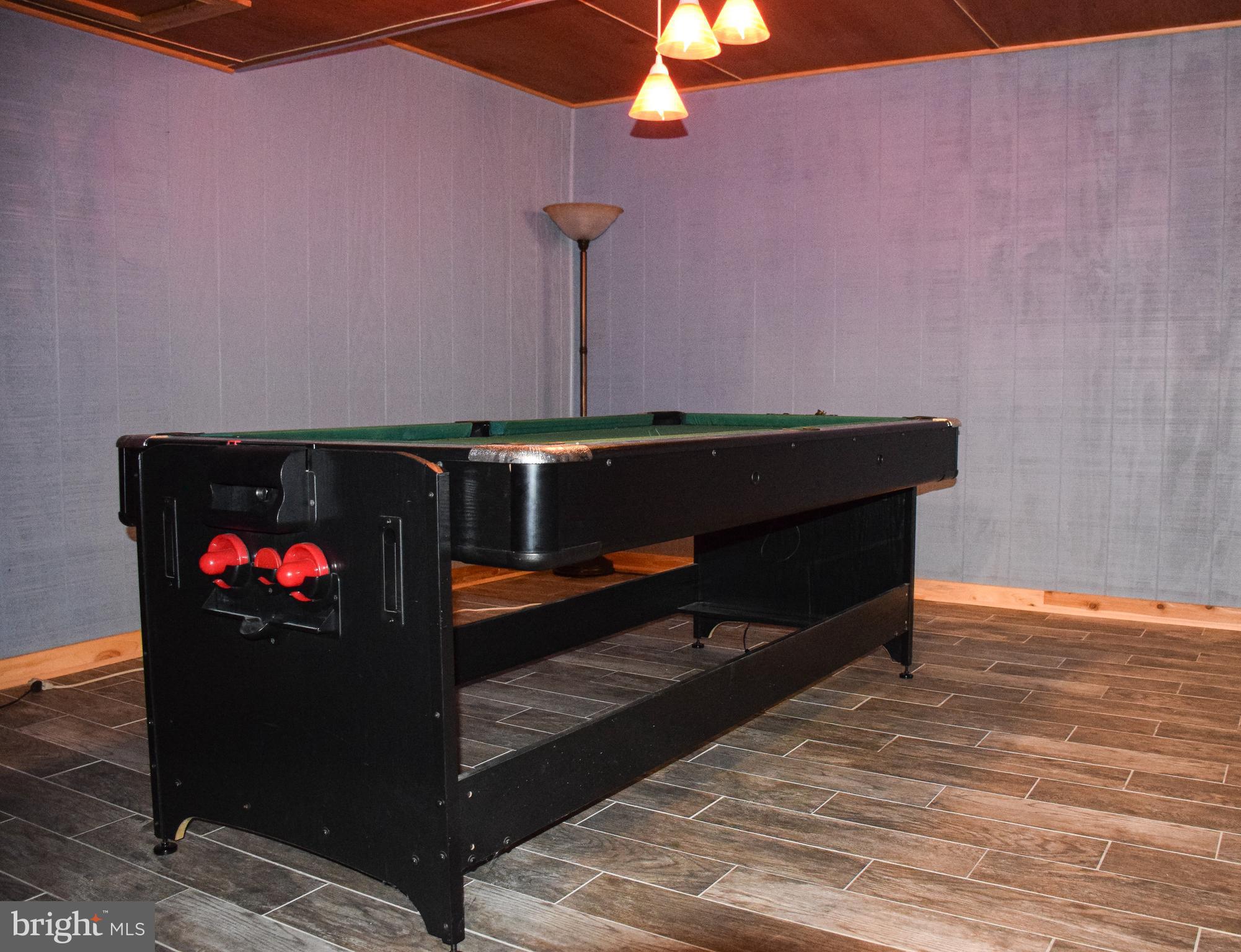 765 Gun Club Road Stephenson, VA 22656 - Photo 63 of 113 a living room with furniture and a fireplace