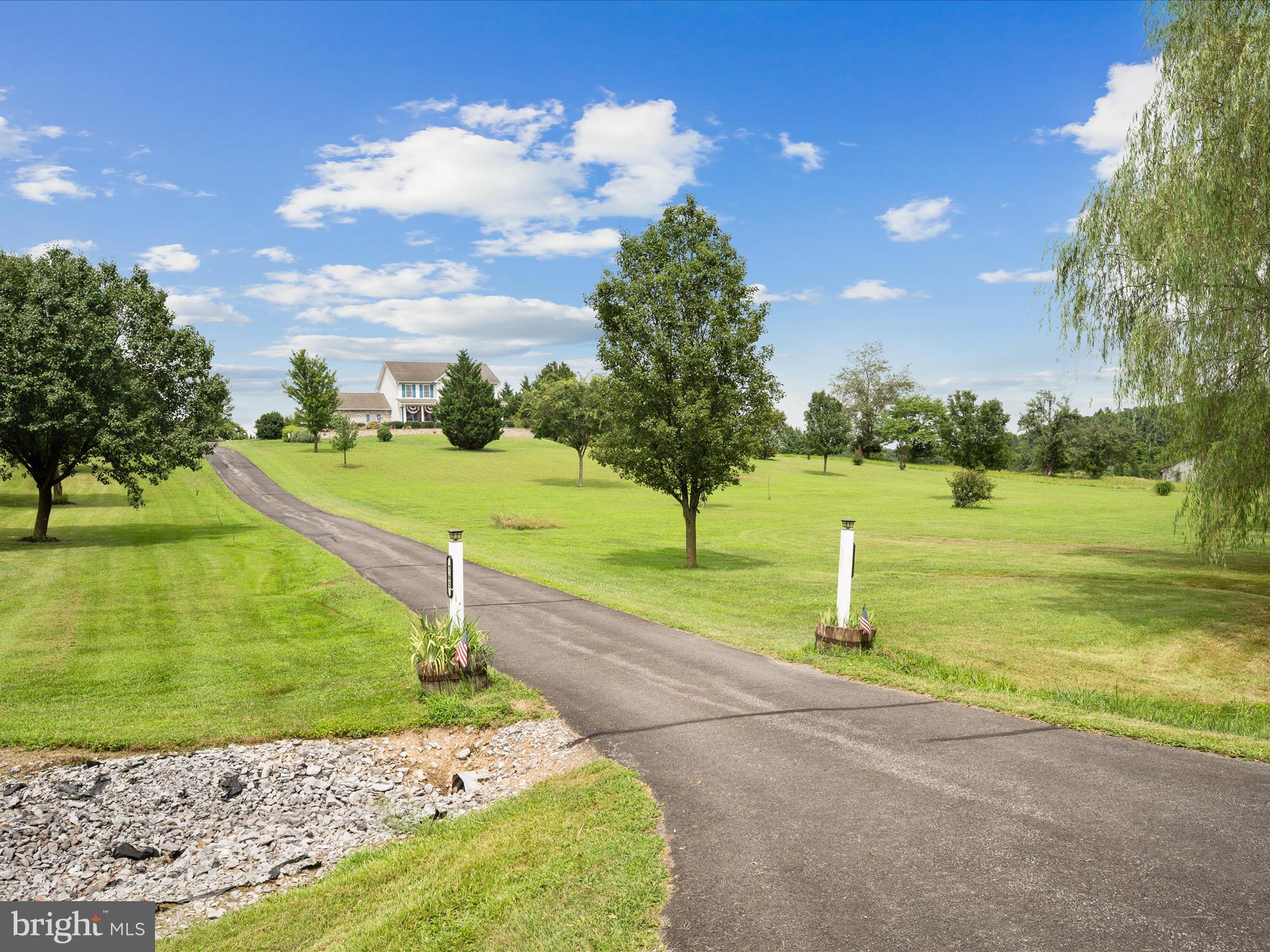 765 Gun Club Road Stephenson, VA 22656 - Photo 72 of 113 a view of a golf course with a lake view