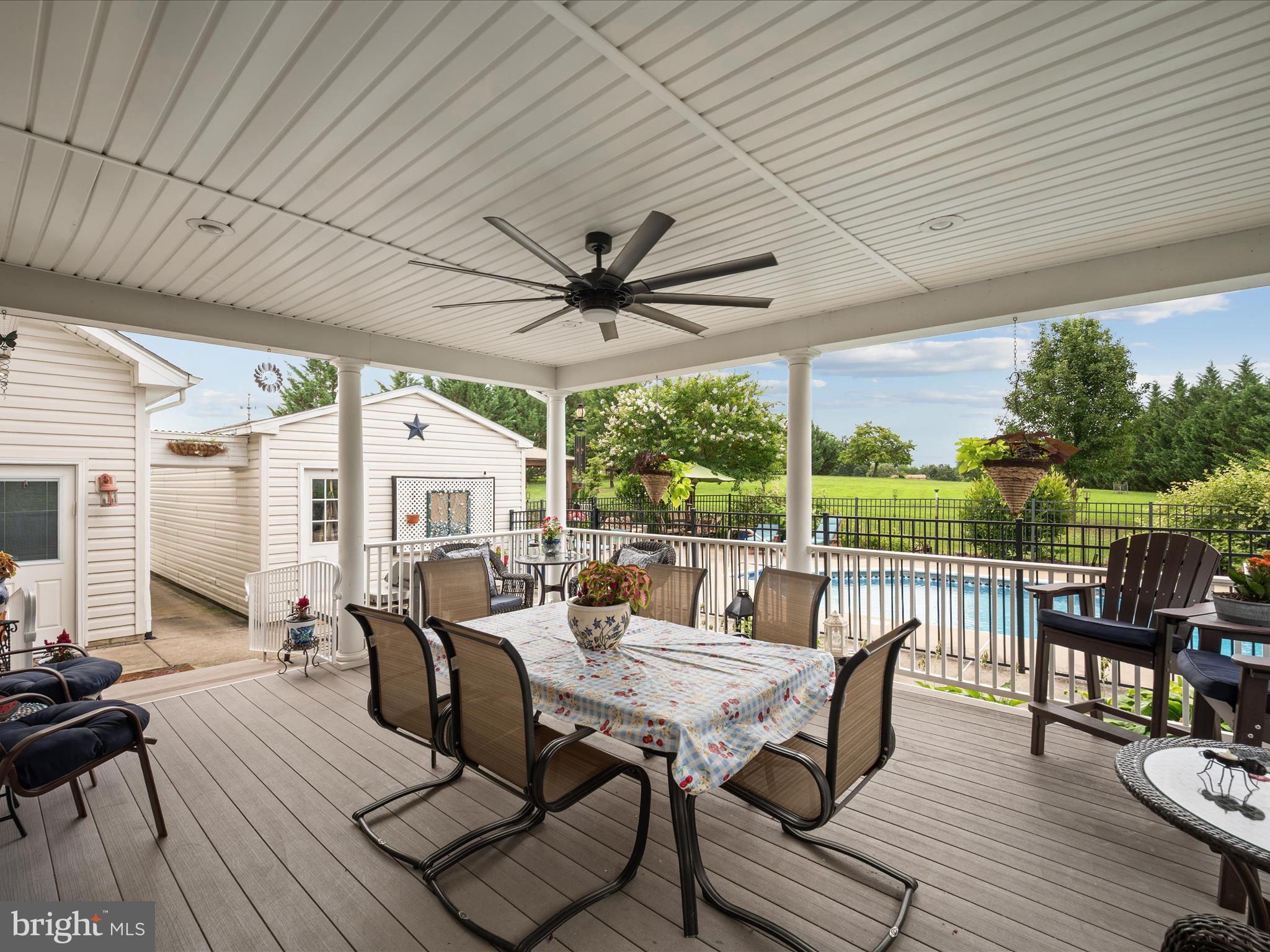 765 Gun Club Road Stephenson, VA 22656 - Photo 77 of 113 a view of a dining room with furniture window and wooden floor