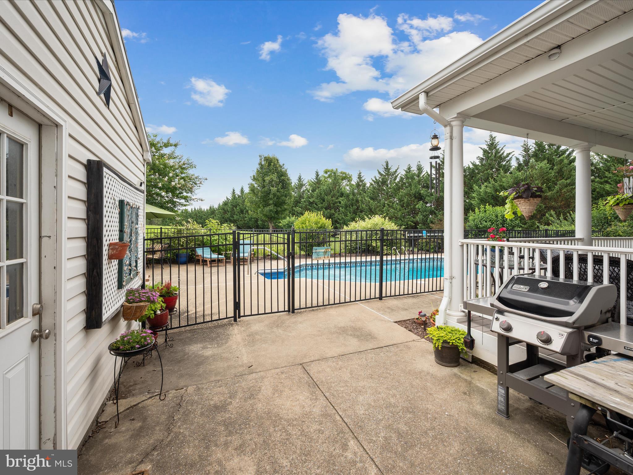 765 Gun Club Road Stephenson, VA 22656 - Photo 78 of 113 a view of a chair and tables in the balcony