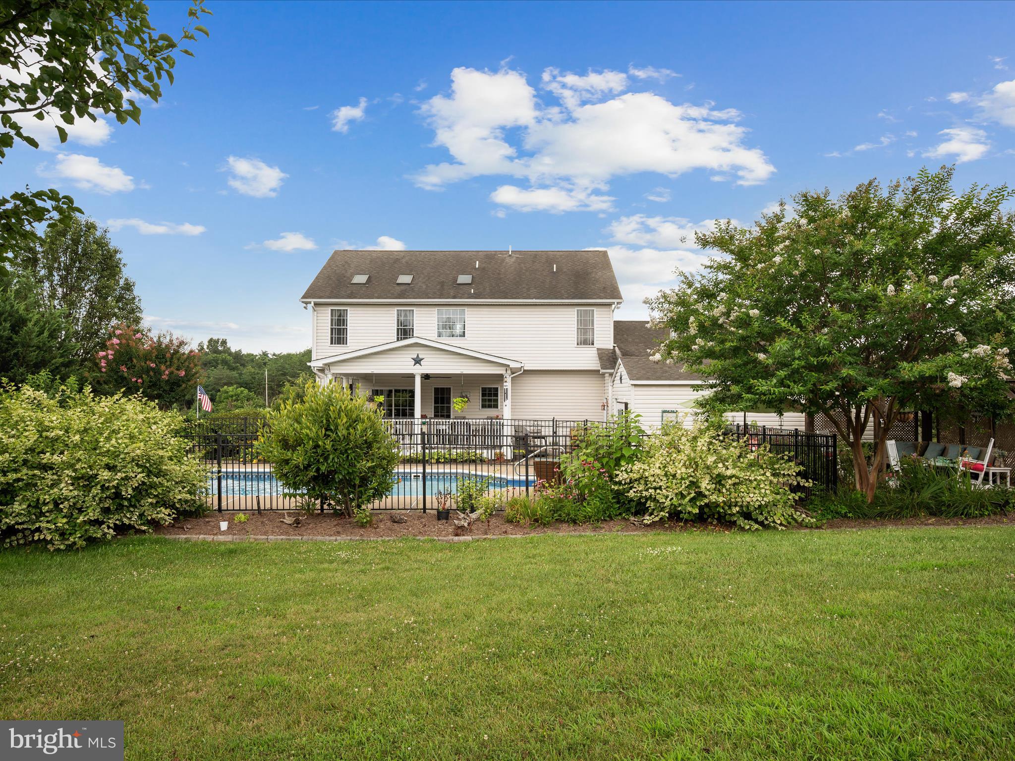 765 Gun Club Road Stephenson, VA 22656 - Photo 87 of 113 a front view of a house with a yard