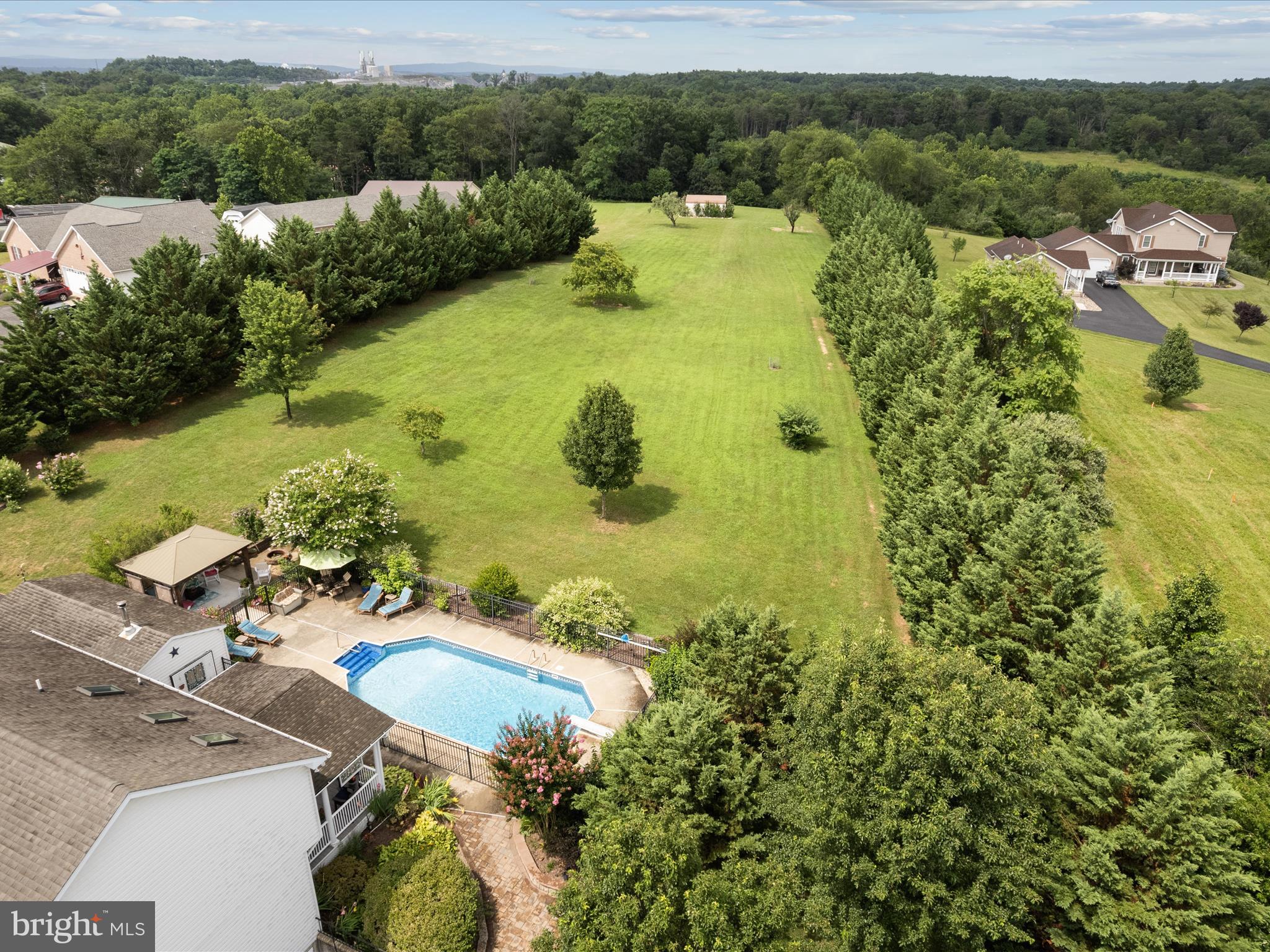 765 Gun Club Road Stephenson, VA 22656 - Photo 94 of 113 a view of a lake with a houses