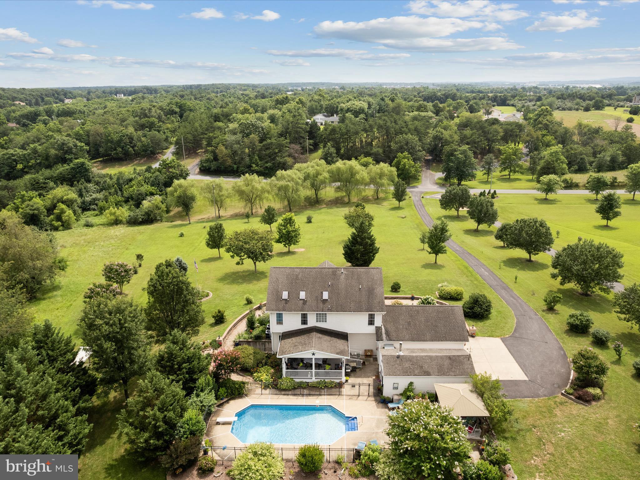 765 Gun Club Road Stephenson, VA 22656 - Photo 95 of 113 an aerial view of residential houses with outdoor space and trees