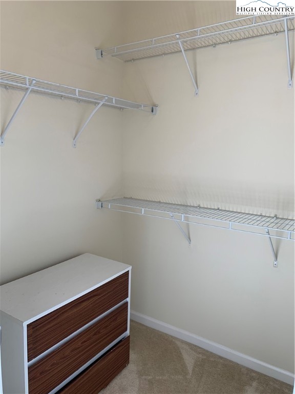 190 Eli Hartley Drive, Unit 210 Boone, NC 28607 - Photo 11 of 19 a view of small space with racks on the wall