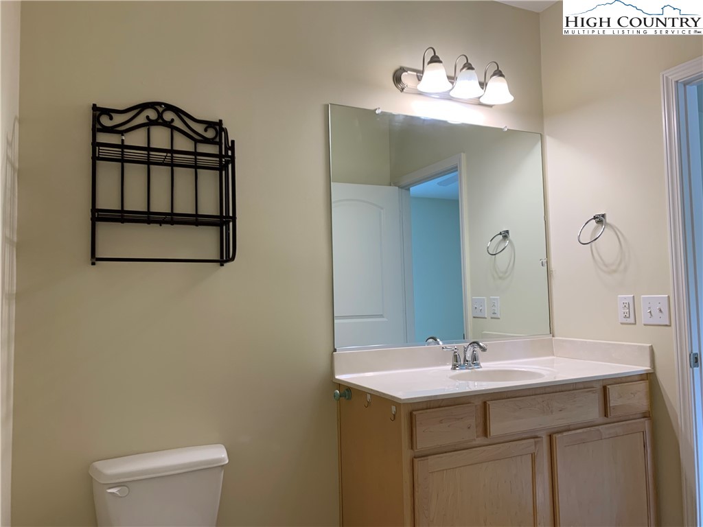 190 Eli Hartley Drive, Unit 210 Boone, NC 28607 - Photo 12 of 19 a bathroom with a sink and a mirror
