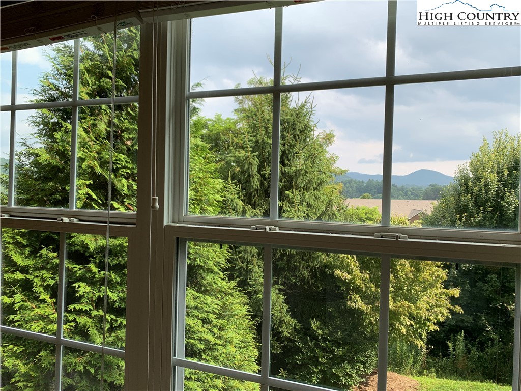 190 Eli Hartley Drive, Unit 210 Boone, NC 28607 - Photo 17 of 19 a view of a balcony with an outdoor space