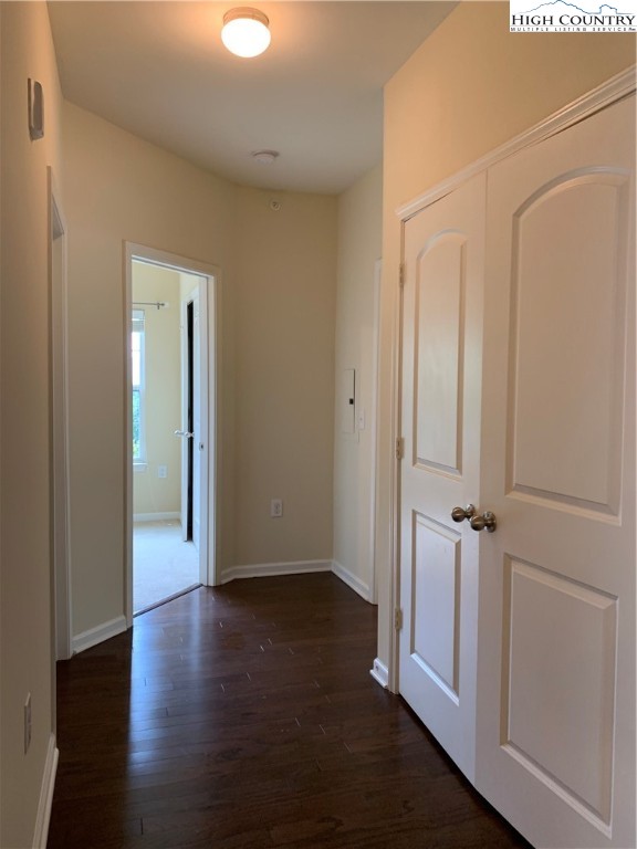 190 Eli Hartley Drive, Unit 210 Boone, NC 28607 - Photo 7 of 19 an empty room with wooden floor and a empty space