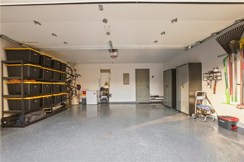 920 Bridge Pointe Court Alpharetta, GA 30005 - Photo 18 of 18 a view of an empty room with furniture and windows