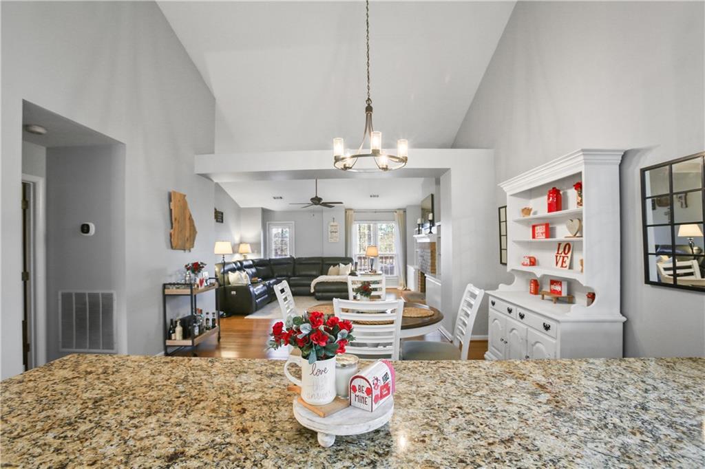 920 Bridge Pointe Court Alpharetta, GA 30005 - Photo 5 of 18 a very nice looking bedroom with a couch