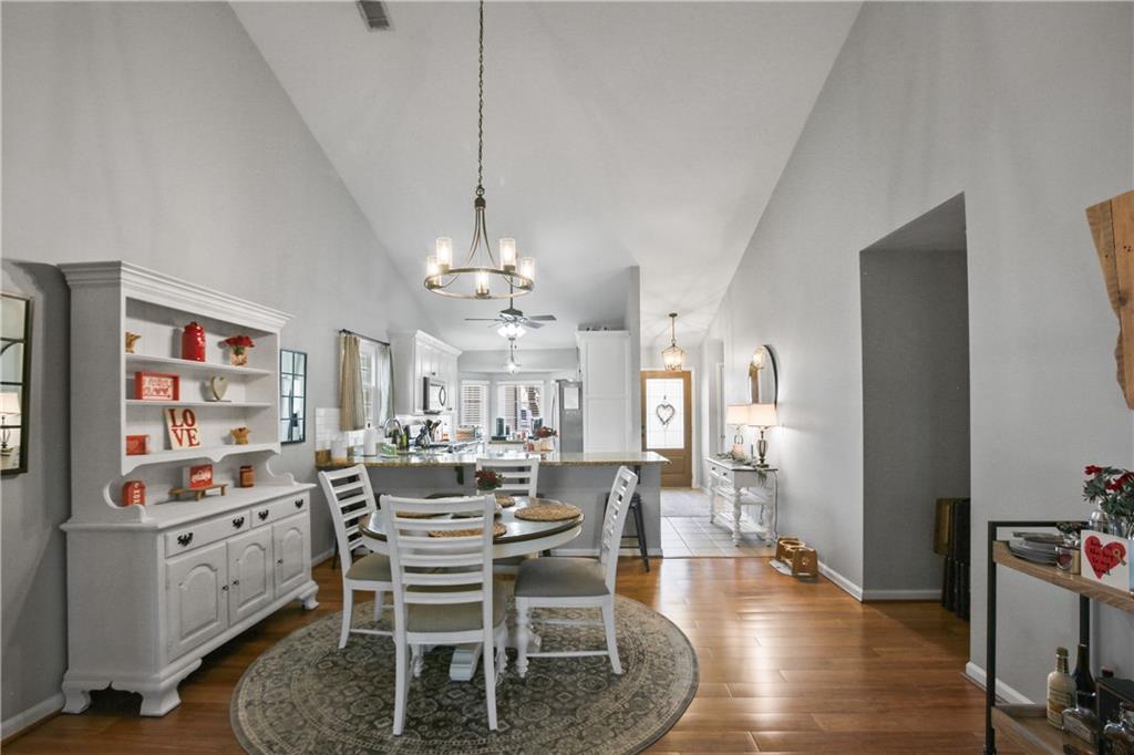 920 Bridge Pointe Court Alpharetta, GA 30005 - Photo 8 of 18 a view of a dining room with furniture