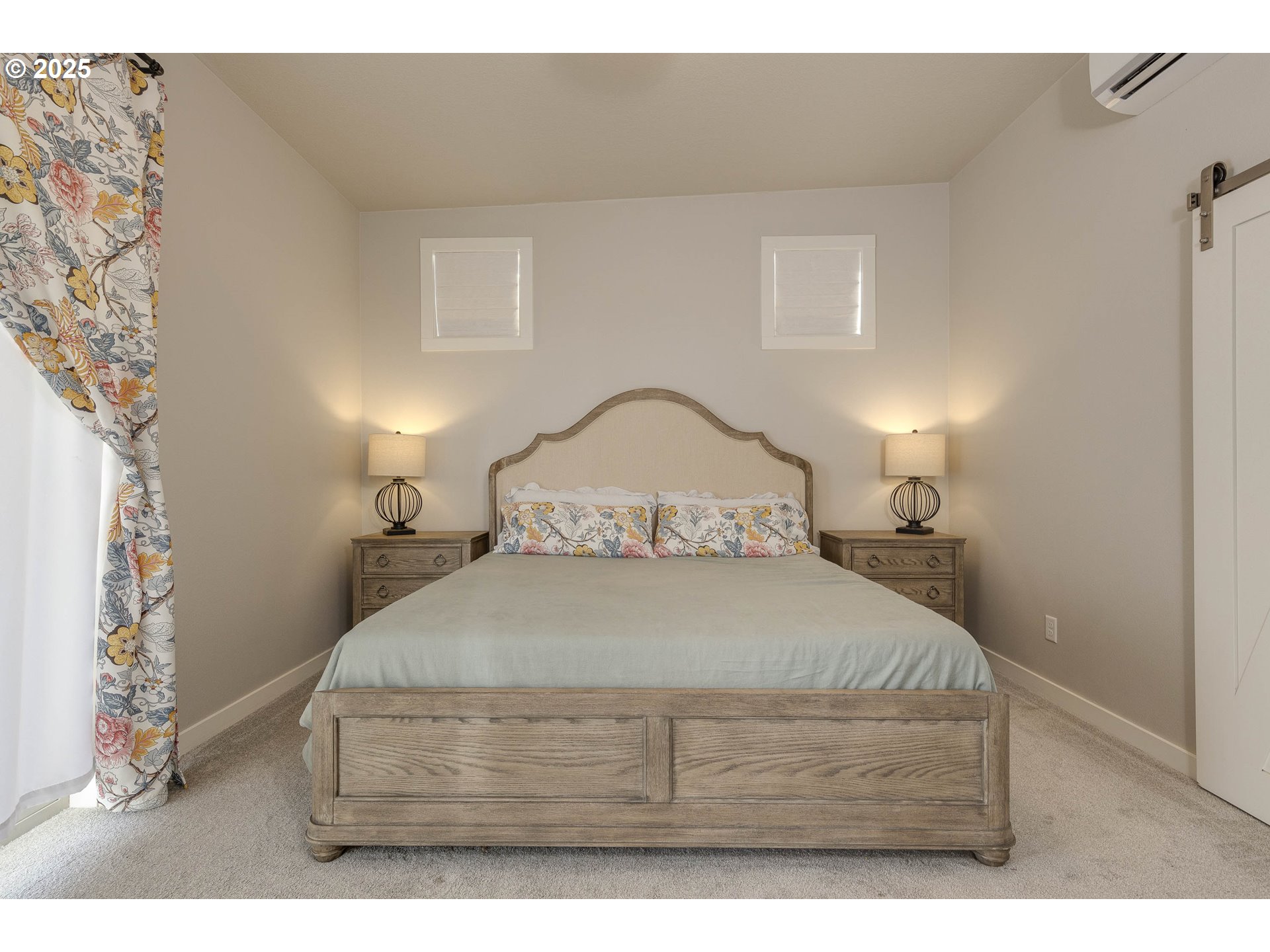 1821 Cousteau Loop Southeast Salem, OR 97302 - Photo 13 of 27 a bedroom with a bed and a night stand