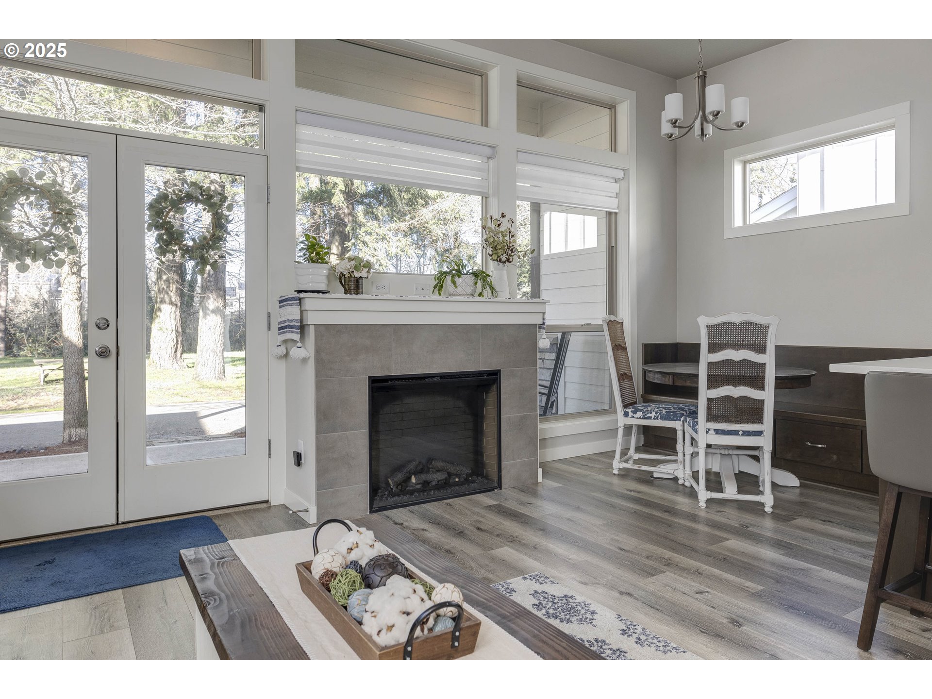 1821 Cousteau Loop Southeast Salem, OR 97302 - Photo 5 of 27 a living room with furniture a fireplace and wooden floor