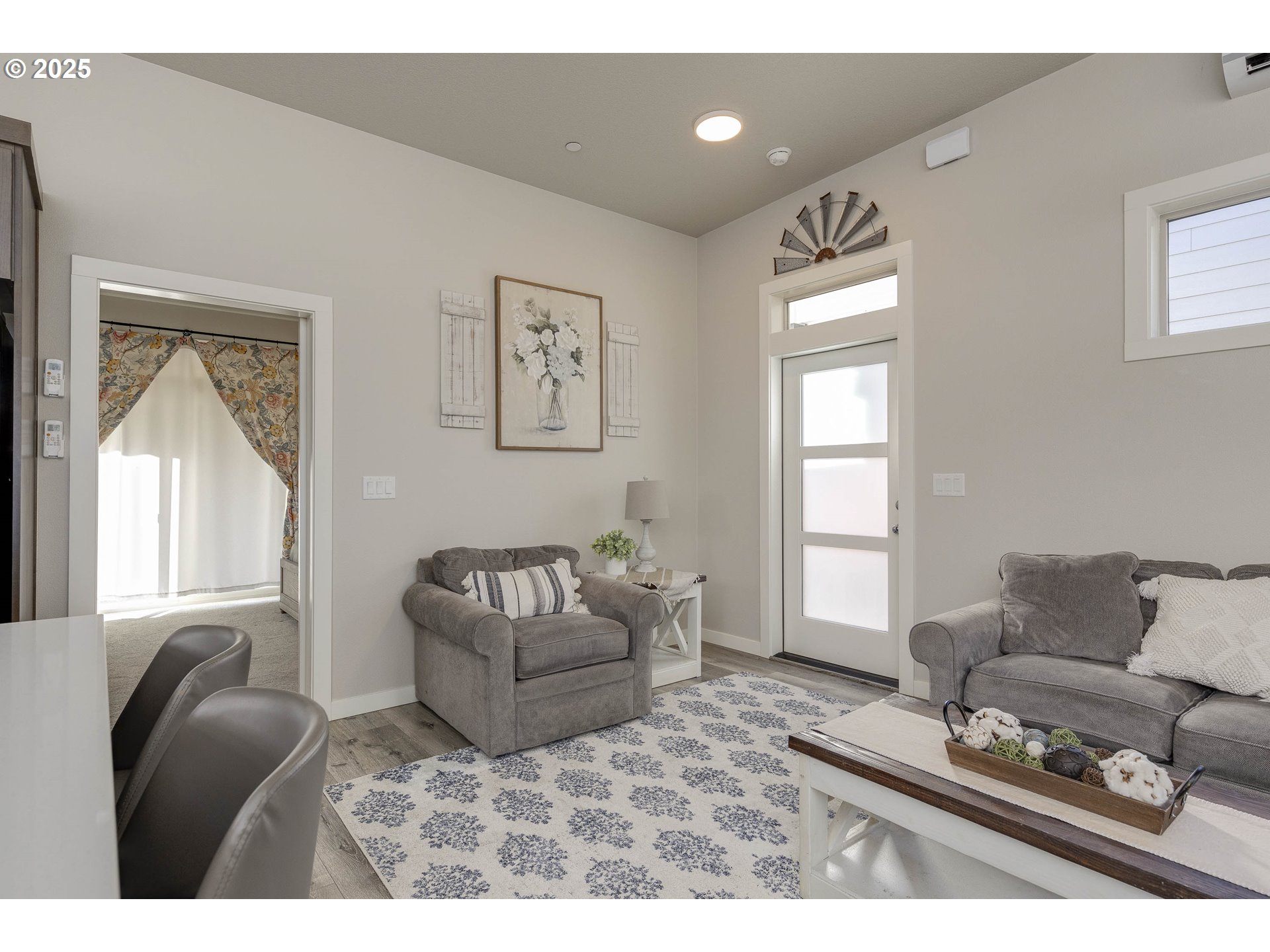 1821 Cousteau Loop Southeast Salem, OR 97302 - Photo 7 of 27 a living room with furniture and a window
