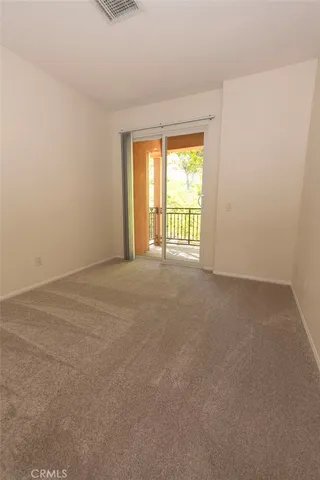 a view of a garden with an outdoor space