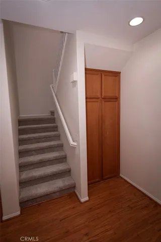 a view of entryway with wooden floor