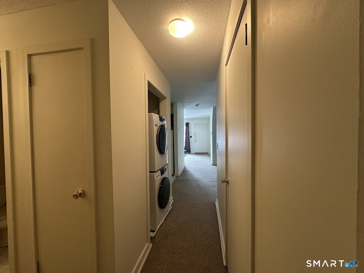 295 Redstone Hill Road, Unit 3 Bristol, CT 06010 - Photo 1 of 13 a view of hallway with a hallway