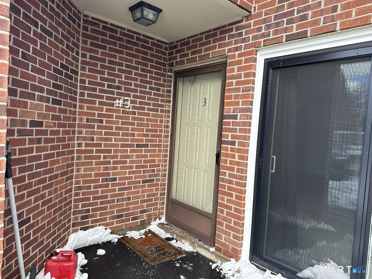 295 Redstone Hill Road, Unit 3 Bristol, CT 06010 - Photo 8 of 13 a view of a brick wall