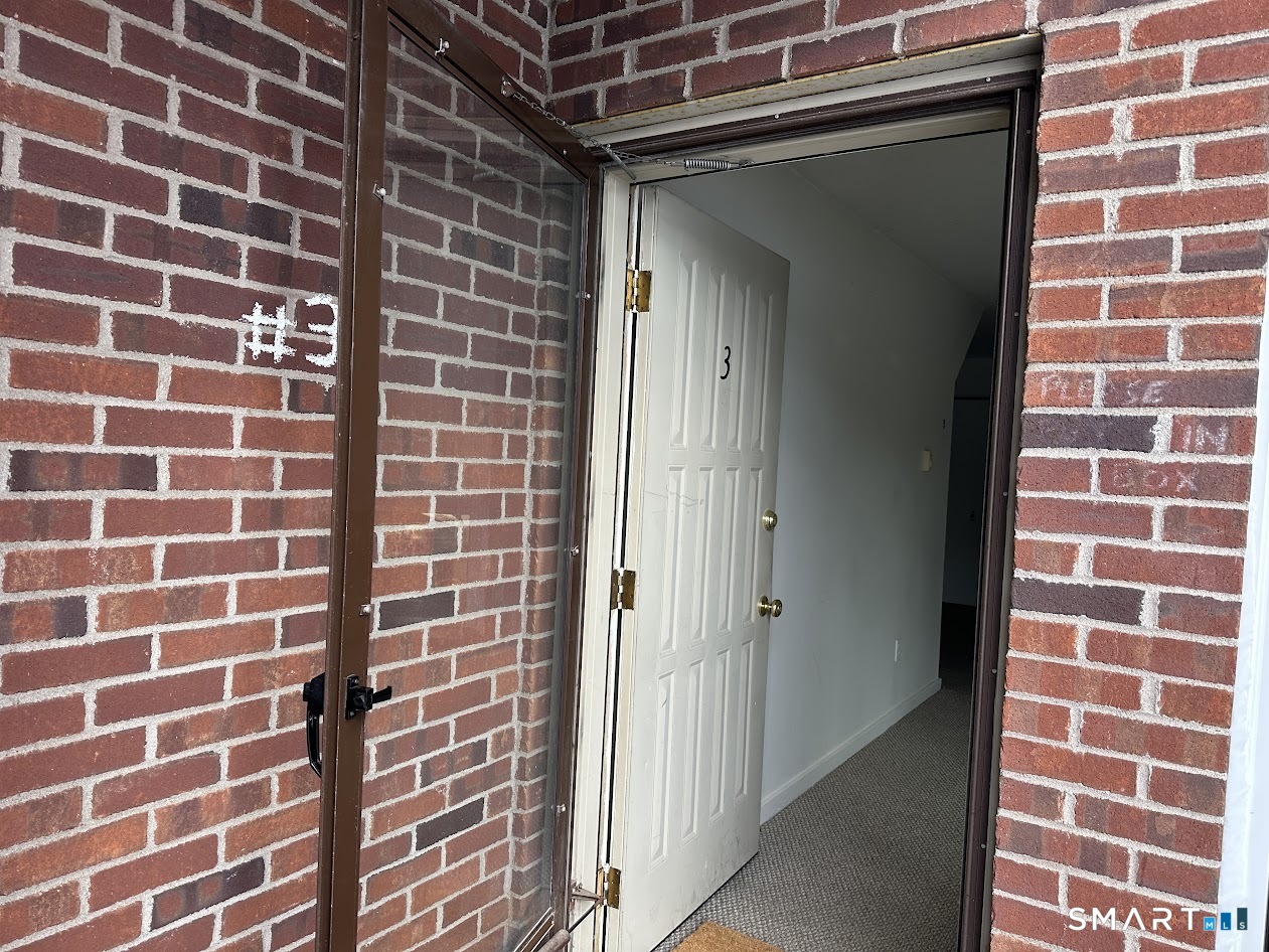 295 Redstone Hill Road, Unit 3 Bristol, CT 06010 - Photo 9 of 13 a view of a brick wall