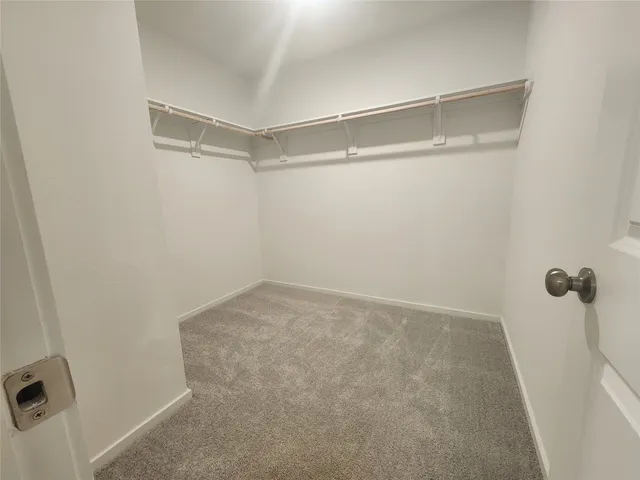 a view of a house with a back yard