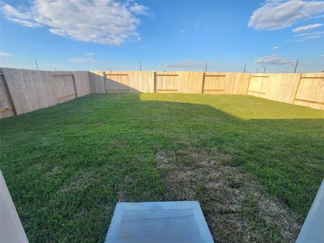 a bathroom with a sink and a large window