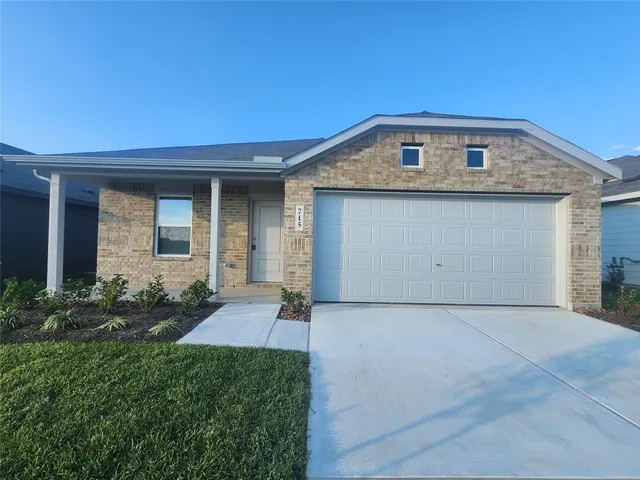 a front view of house with yard