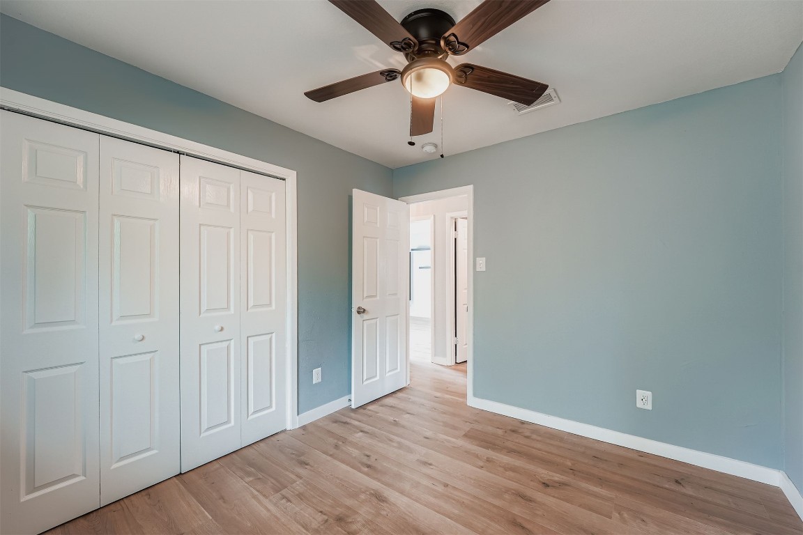 10302 Button Quail Cove Austin, TX 78758 - Photo 30 of 39 wooden floor in an empty room
