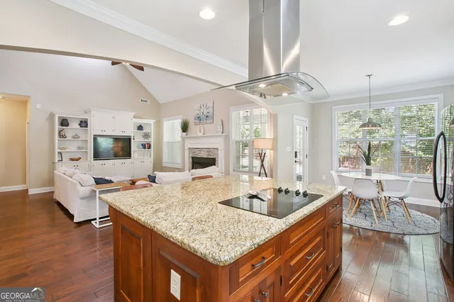 a bedroom with a bed dresser and a window