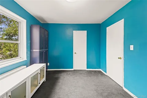 a bathroom with a bathtub and a sink