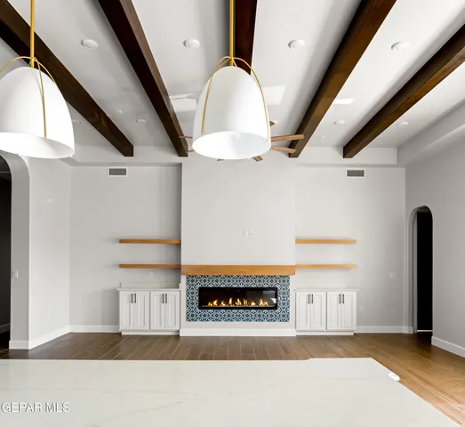 a bathroom with a toilet a sink and shower