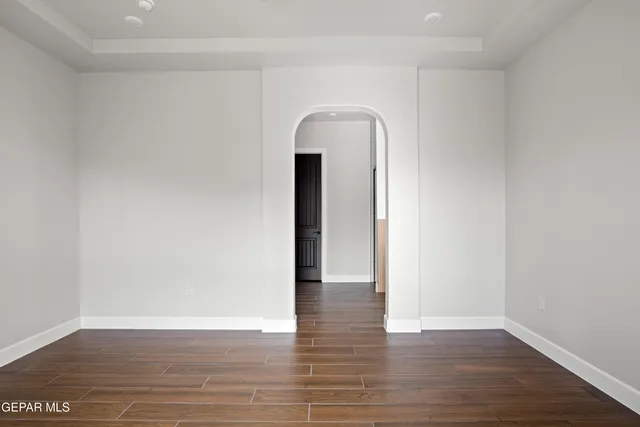 a bathroom with a double vanity sink and mirror