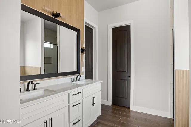 a bathroom with a bathtub and a window