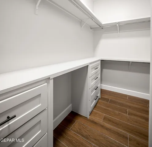 a kitchen with stainless steel appliances a stove and a refrigerator