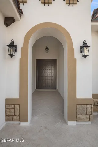 a view of a living room with a fireplace