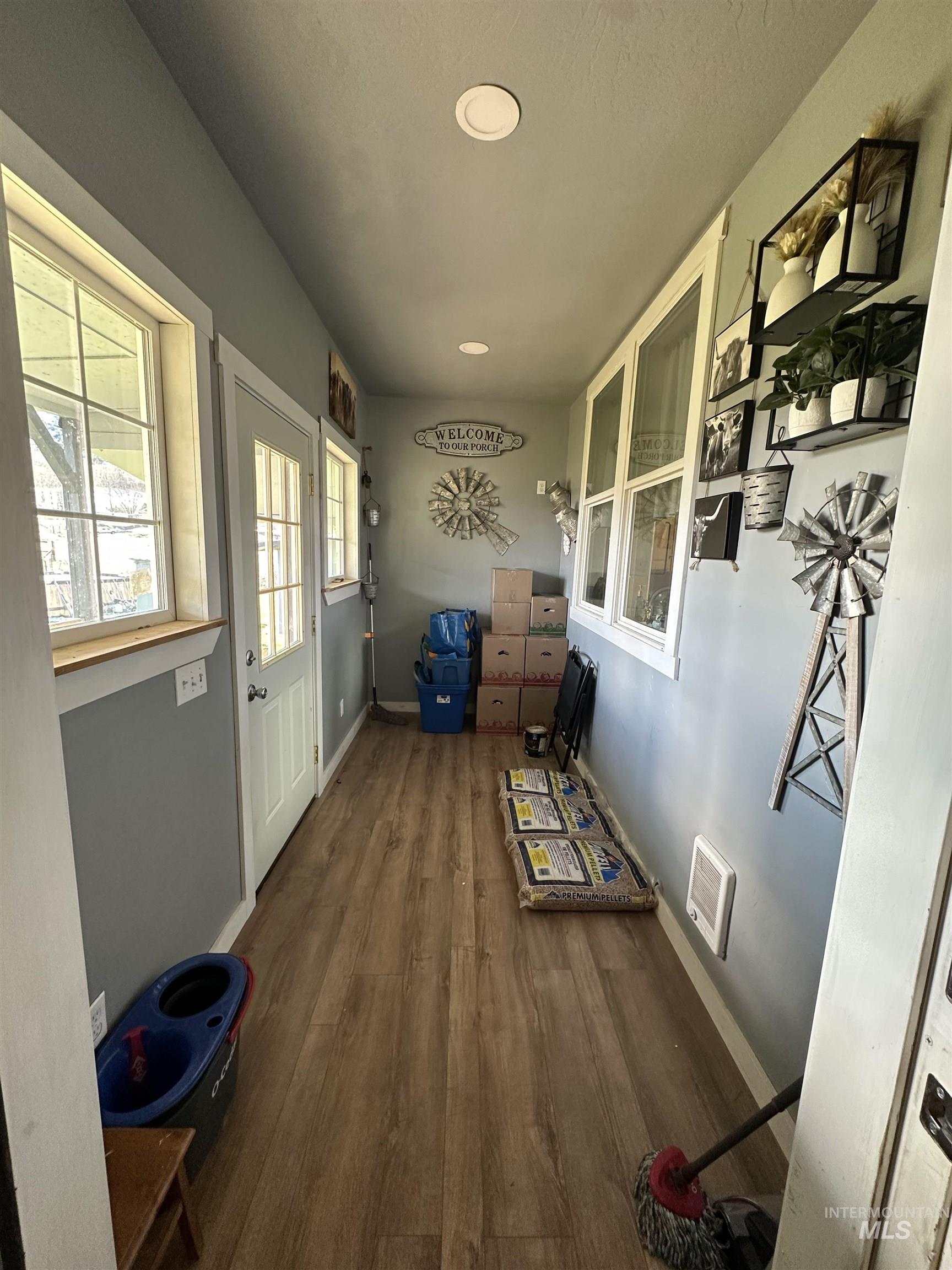2859 Luke's Gulch Road Stites, ID 83552 - Photo 24 of 48 Doorway to outside featuring wood finished floors and baseboards