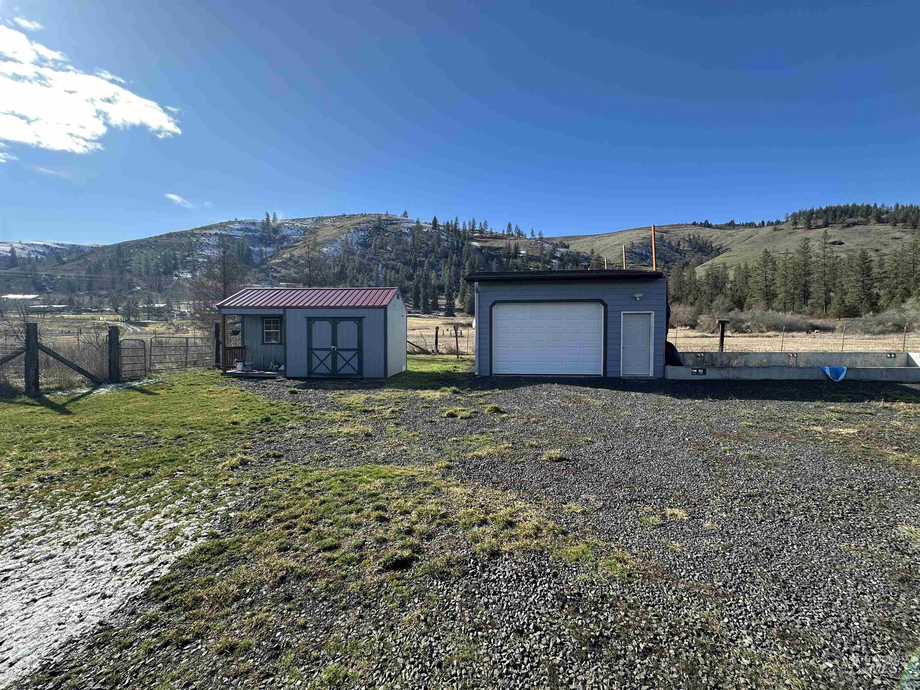 2859 Luke's Gulch Road Stites, ID 83552 - Photo 34 of 48 View of yard with an outdoor structure, a view of countryside, and a mountain view