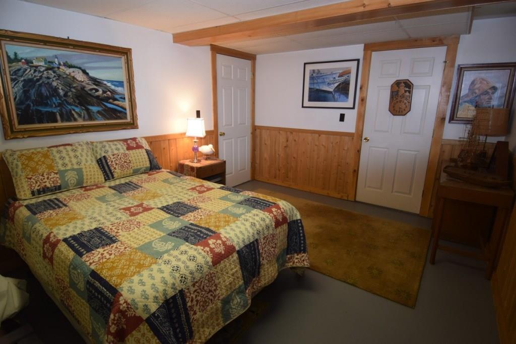 1717 Embden Pond Road Embden, ME 04958 - Photo 22 of 42 Lower level bedroom
