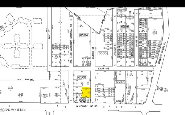 a sign broad on a wall of a city