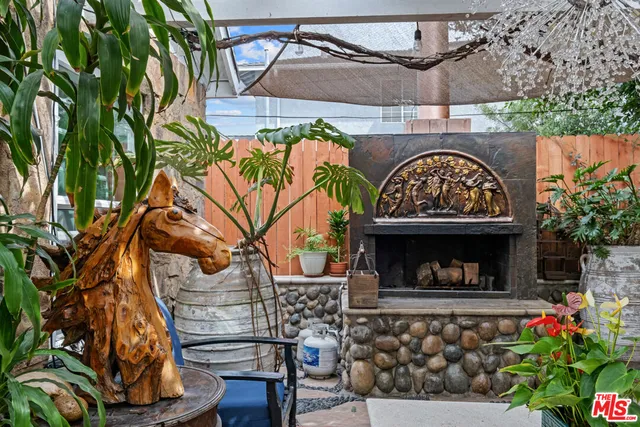 a view of entryway with a fireplace