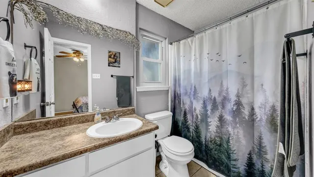 an aerial view of house with yard