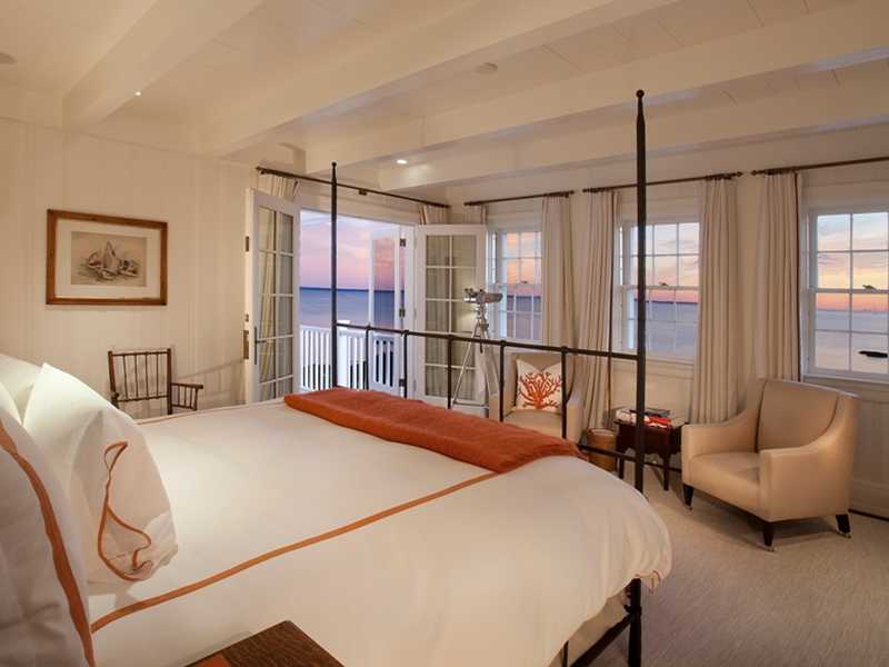 18 Rocky Point Road Rowayton, CT 06853 - Photo 16 of 24 a bedroom with a bed and a couch