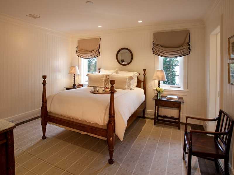 18 Rocky Point Road Rowayton, CT 06853 - Photo 18 of 24 a bedroom with a bed and window