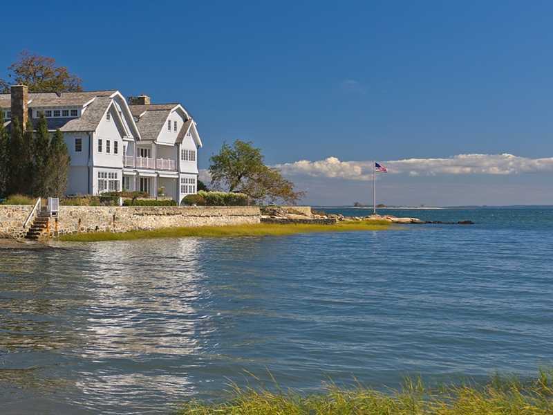 18 Rocky Point Road Rowayton, CT 06853 - Photo 2 of 24 a view of a large body of water with water fall