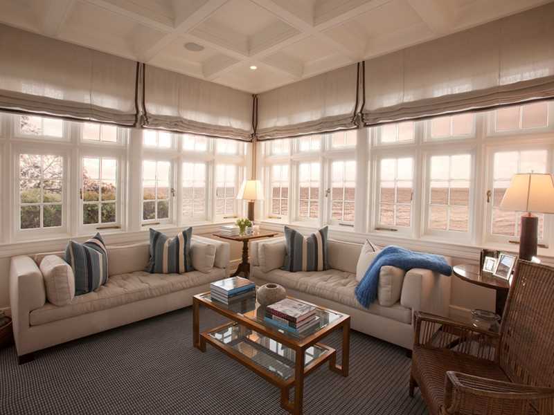 18 Rocky Point Road Rowayton, CT 06853 - Photo 10 of 24 a living room with furniture and floor to ceiling windows