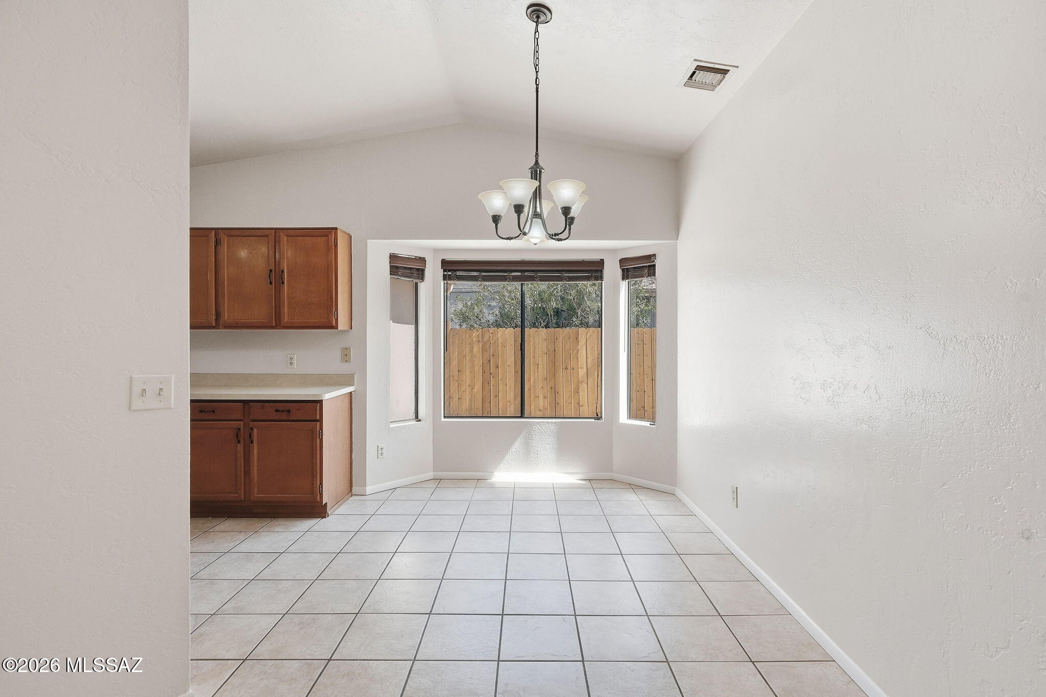 5791 North Moonbrook Road Tucson, AZ 85741 - Photo 12 of 40 Dining Area with Bay Window off the Kitchen