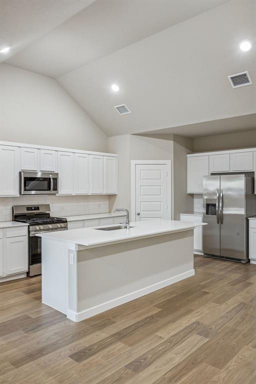 1404 Companero Street Haslet, TX 76052 - Photo 10 of 40 Kitchen in the Wimbledon home plan by Trophy Signature Homes – REPRESENTATIVE PHOTO