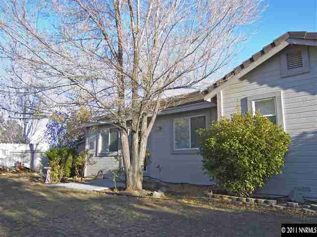 2225 Ridgeview Drive Reno, NV 89519 - Photo 11 of 12 a front view of a house with a yard