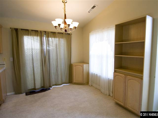 2225 Ridgeview Drive Reno, NV 89519 - Photo 4 of 12 a view of a chandelier in a room